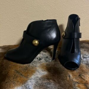 Micheal Kors leather open toe booties.